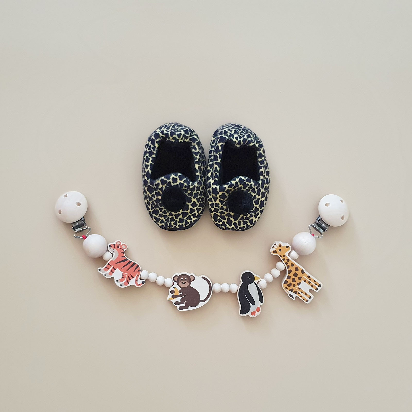 Geschenk zur Geburt Kinderwagenkette mit Wildtieren und Tiger Baby Tigerfinkli